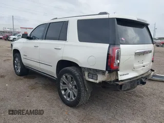 2015 GMC Yukon Denali z VIN 1GKS1CKJ3FR713531, wystawiony jako IAAI lot #41866691 z przebiegiem 157 666 mil mil oraz . Historia ofert i sprzedaży dostępna na DreamBid. Obrazek 3.
