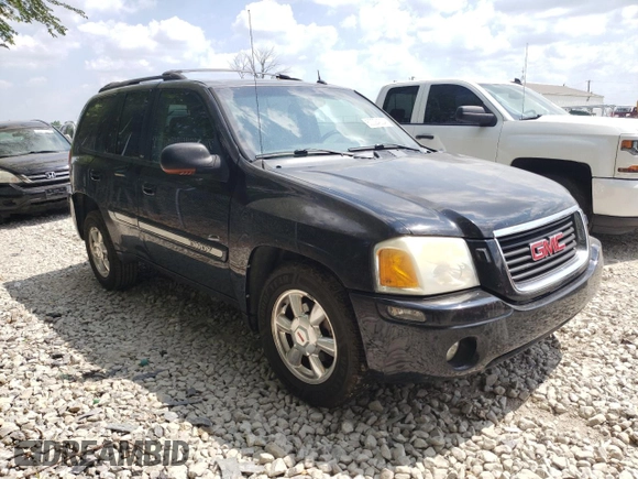 2004 GMC Envoy SLT with VIN 1GKDT13S042281050, listed as a Copart auction lot 60024304 with 267,205 mi miles and Salvage Title. Bid and sale history available at carsss.com. Image 4.