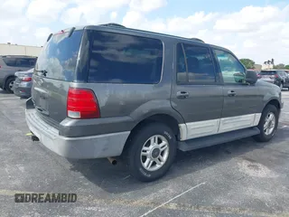 2003 Ford Expedition Special Service with VIN 1FMRU15W13LA15281, listed as a IAAI auction lot 42060325 with 143,869 mi miles. Bid and sale history available at carsss.com. Image 4.