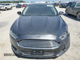 2015 Ford Fusion SE with VIN 3FA6P0HD8FR230364, listed as a Copart auction lot 52631195 with 196,285 mi miles and Salvage title. Bid and sale history available at DreamBid. Image 5.