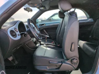 2013 Volkswagen Beetle 2.5L with VIN 3VW5X7AT4DM829494, listed as a Copart auction lot 47654065 with 34,987 mi miles and Salvage title. Bid and sale history available at DreamBid. Image 7.