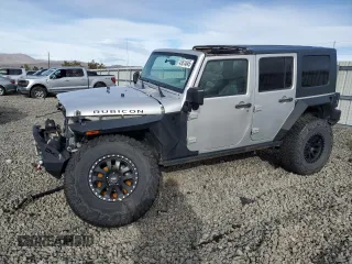 2009 Jeep Wrangler Unlimited Rubicon with VIN 1J8GA69139L703848, listed as a Copart auction lot 43614645 with 172,801 mi miles and Salvage title. Bid and sale history available at DreamBid. Image 1.