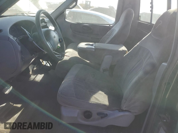 1999 Ford F-150 XL with VIN 2FTZF0720XCA14612, listed as a Copart auction lot 75092304 with 230,897 mi miles and Salvage Title. Bid and sale history available at carsss.com. Image 7.