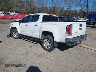 2015 GMC Canyon 2WD SLE with VIN 1GTG5BE32F1254150, listed as a IAAI auction lot 41380439 with 129,098 mi miles. Bid and sale history available at carsss.com. Image 3.