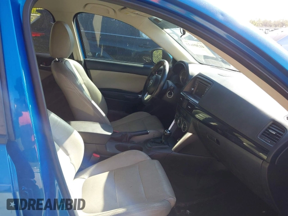 2014 Mazda CX-5 Touring with VIN JM3KE2CYXE0310873, listed as a IAAI auction lot 41309633 with 175,325 mi miles and . Bid and sale history available at DreamBid. Image 5.