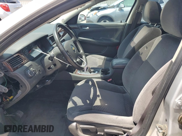 2014 Chevrolet Impala LT with VIN 2G1WB5E38E1124073, listed as a Copart auction lot 59691855 with 169,875 mi miles and Salvage title. Bid and sale history available at DreamBid. Image 7.