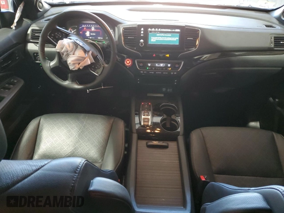 2023 Honda Passport Elite with VIN 5FNYF8H03PB034613, listed as a Copart auction lot 54009215 with 102,841 mi miles and Salvage title. Bid and sale history available at DreamBid. Image 8.