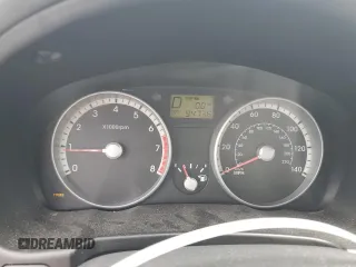 2009 Hyundai Accent Auto GLS z VIN KMHCN46C19U373167, wystawiony jako Copart lot #60026445 z przebiegiem 94 736 mil mil oraz Szkoda całkowita • Salvage title. Historia ofert i sprzedaży dostępna na DreamBid. Obrazek 9.