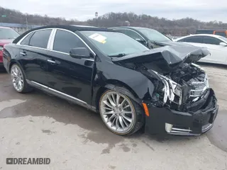 2013 Cadillac XTS Platinum with VIN 2G61V5S37D9194227, listed as a IAAI auction lot 41510449 with 114243 miles. Bid and sale history available at carsss.com. Image 1.