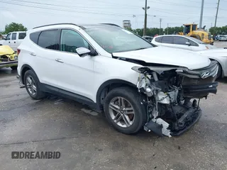 2017 Hyundai Santa Fe 2.4L with VIN 5XYZU3LB1HG433214, listed as a IAAI auction lot 42243024 with 117,693 mi miles and . Bid and sale history available at DreamBid. Image 1.