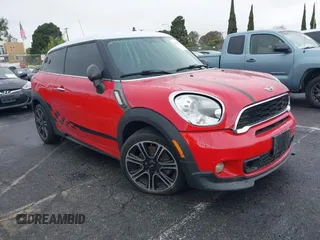 2014 MINI Paceman S with VIN WMWSS5C58EWN66898, listed as a IAAI auction lot 41513529 with 86,406 mi miles and . Bid and sale history available at DreamBid. Image 1.
