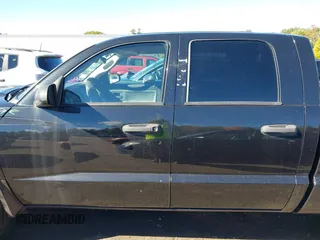 2011 Ram Dakota Bighorn/Lonestar with VIN 1D7RW3GK1BS606466, listed as a IAAI auction lot 40529380 with 110,431 mi miles. Bid and sale history available at carsss.com. Image 14.