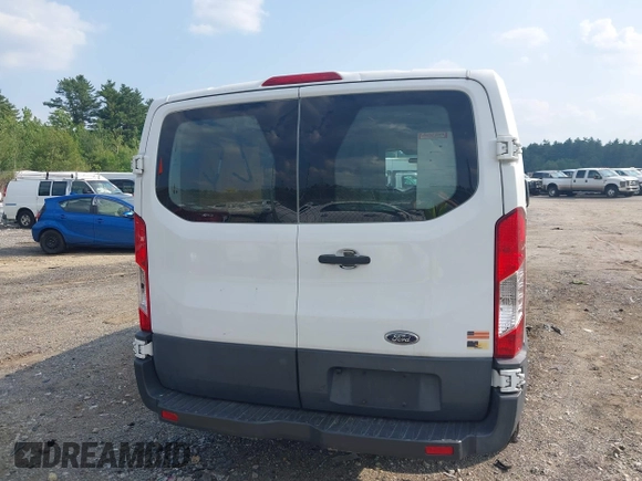 2015 Ford Transit Cargo z VIN 1FTNR1ZM5FKA65799, wystawiony jako IAAI lot #42473586 z przebiegiem 99 756 mil mil oraz . Historia ofert i sprzedaży dostępna na DreamBid. Obrazek 16.