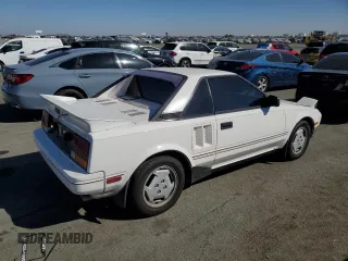 1986 Toyota MR2 z VIN JT2AW15CXG0080034, wystawiony jako Copart lot #73423944 z przebiegiem 54 316 mil mil oraz Szkody całkowita. Historia ofert i sprzedaży dostępna na DreamBid. Obrazek 3.