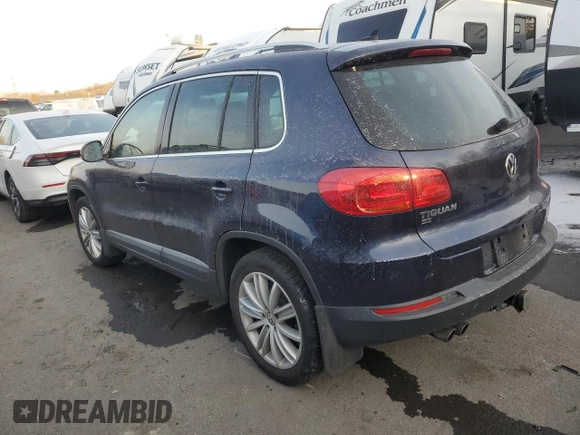 2016 Volkswagen Tiguan R-Line with VIN WVGBV7AX5GW573820, listed as a Copart auction lot 42363515 with 124,283 mi miles and Salvage Title. Bid and sale history available at DreamBid. Image 2.