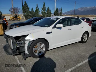 2015 Kia Optima LX with VIN KNAGM4A79F5640013, listed as a Copart auction lot 47748535 with 101,458 mi miles and Salvage title. Bid and sale history available at DreamBid. Image 1.