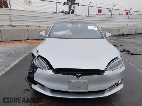 2016 Tesla Model S 70 with VIN 5YJSA1E17GF156514, listed as a IAAI auction lot 41869006 with 17,704 mi miles and . Bid and sale history available at DreamBid. Image 12.