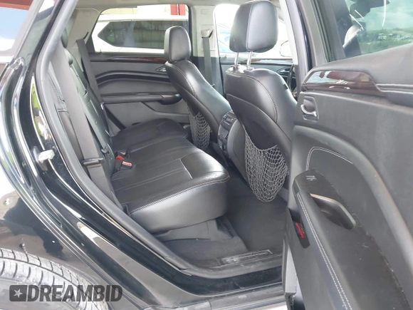 2012 Cadillac SRX Premium Collection z VIN 3GYFNCE36CS615725, wystawiony jako IAAI lot #42738584 z przebiegiem 156 625 mil mil oraz . Historia ofert i sprzedaży dostępna na DreamBid. Obrazek 8.