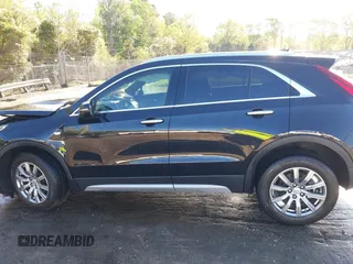 2021 Cadillac XT4 FWD Premium Luxury with VIN 1GYFZCR43MF052422, listed as a IAAI auction lot 41985859 with 25,112 mi miles. Bid and sale history available at carsss.com. Image 14.