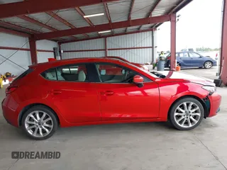 2014 Mazda 3 S Grand Touring with VIN JM1BM1M38E1200696, listed as a IAAI auction lot 41906426 with 50,048 mi miles and . Bid and sale history available at DreamBid. Image 13.