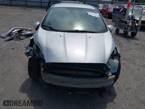 2019 Ford Fiesta SE z VIN 3FADP4EJ9KM107124, wystawiony jako IAAI lot #42067464 z przebiegiem 89 076 mil mil oraz . Historia ofert i sprzedaży dostępna na DreamBid. Obrazek 6.