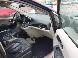2017 Chrysler Pacifica Touring L with VIN 2C4RC1BG1HR797200, listed as a IAAI auction lot 42044020 with 124,115 mi miles and . Bid and sale history available at DreamBid. Image 5.