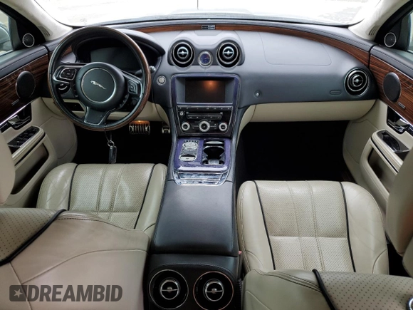 2013 Jaguar XJ with VIN SAJWA2GB7DLV40560, listed as a Copart auction lot 78228114 with 110,750 mi miles and Salvage Title. Bid and sale history available at carsss.com. Image 8.