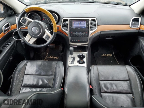 2013 Jeep Grand Cherokee Overland with VIN 1C4RJFCT9DC615096, listed as a Copart auction lot 86817074 with 112,421 mi miles and Salvage Title. Bid and sale history available at carsss.com. Image 8.