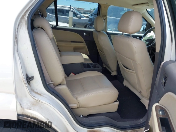 2009 Ford Taurus X Limited z VIN 1FMDK03W99GA03698, wystawiony jako IAAI lot #42243428 z przebiegiem 158 551 mil mil oraz . Historia ofert i sprzedaży dostępna na DreamBid. Obrazek 8.