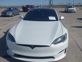 2022 Tesla Model S Plaid with VIN 5YJSA1E69NF486471, listed as a IAAI auction lot 41228818 with 49,207 mi miles and . Bid and sale history available at carsss.com. Image 12.