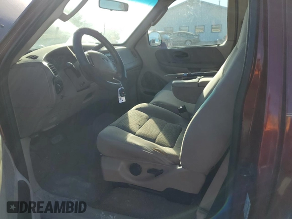 2003 Ford F-150 XL with VIN 1FTRF17L63NA32146, listed as a Copart auction lot 75204414 with 1,745,073 mi miles and Salvage Title. Bid and sale history available at DreamBid. Image 7.