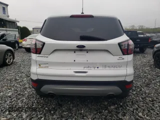 2017 Ford Escape SE with VIN 1FMCU9GDXHUD44286, listed as a Copart auction lot 54864485 with 138,212 mi miles and Clean Title. Bid and sale history available at carsss.com. Image 6.