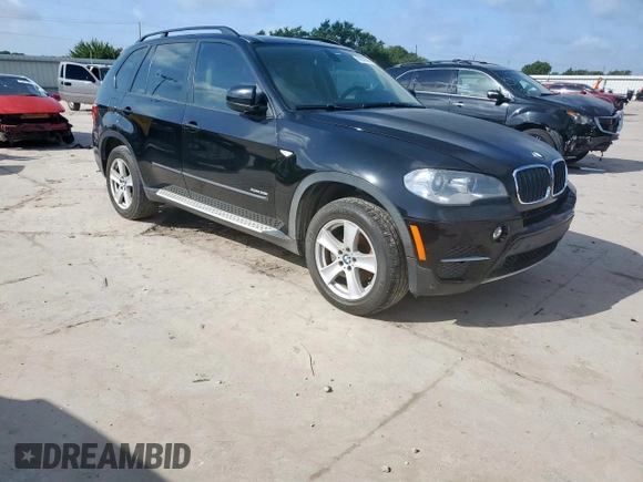 2012 BMW X5 35i с VIN 5UXZV4C52CL988794, выставлен на аукционе Copart как лот 61688485 с пробегом Не указан миль и Чистый • Clean title. История ставок и продаж доступна на DreamBid. Изображение 4.