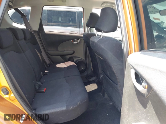 2009 Honda Fit Sport z VIN JHMGE88459S053122, wystawiony jako IAAI lot #42195267 z przebiegiem 47 349 mil mil oraz . Historia ofert i sprzedaży dostępna na DreamBid. Obrazek 8.