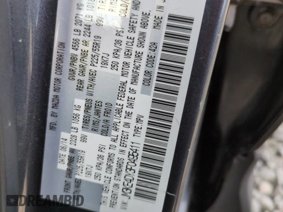 2015 Mazda CX-5 Grand Touring with VIN JM3KE4DY3F0495411, listed as a Copart auction lot 50077765 with 136,191 mi miles and Salvage Title. Bid and sale history available at DreamBid. Image 12.