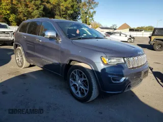 2020 Jeep Grand Cherokee High Altitude with VIN 1C4RJFCG8LC414937, listed as a Copart auction lot 75509304 with 56,841 mi miles and Salvage title. Bid and sale history available at DreamBid. Image 4.