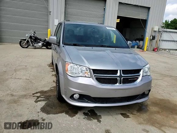 2016 Dodge Grand Caravan SXT with VIN 2C4RDGCG1GR369947, listed as a Copart auction lot 54504805 with 135,179 mi miles and Salvage Title. Bid and sale history available at DreamBid. Image 14.