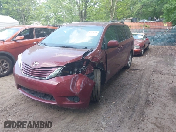 2015 Toyota Sienna LE AAS with VIN 5TDKK3DC5FS576035, listed as a IAAI auction lot 42579218 with 199,664 mi miles and . Bid and sale history available at DreamBid. Image 2.