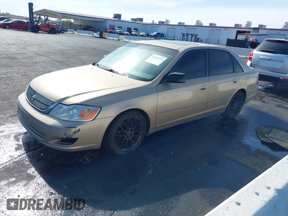 2001 Toyota Avalon XL w/Bucket Seats with VIN 4T1BF28BX1U117793, listed as a IAAI auction lot 42165172 with 247,435 mi miles. Bid and sale history available at carsss.com. Image 2.