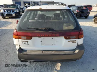 1996 Subaru Legacy Outback with VIN 4S3BG6857T7386841, listed as a Copart auction lot 70968724 with 122,232 mi miles and Salvage title. Bid and sale history available at DreamBid. Image 6.