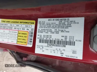 2016 Ford Fusion Titanium Hybrid with VIN 3FA6P0RU3GR355398, listed as a IAAI auction lot 41140669 with 125,959 mi miles. Bid and sale history available at carsss.com. Image 9.