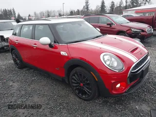 2019 MINI Clubman Cooper S with VIN WMWLU5C52K2G03545, listed as a IAAI auction lot 41279158 with 56,875 mi miles. Bid and sale history available at carsss.com. Image 1.