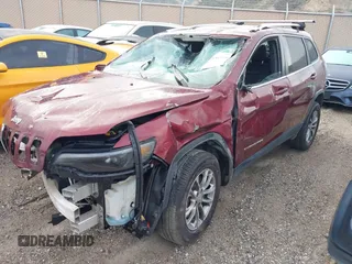 2019 Jeep Cherokee Latitude Plus with VIN 1C4PJMLX8KD330606, listed as a IAAI auction lot 41733246 with 94,408 mi miles. Bid and sale history available at carsss.com. Image 6.