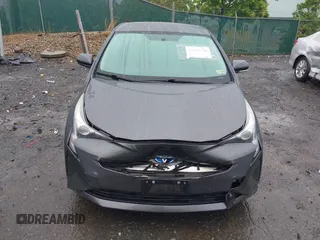 2016 Toyota Prius Two z VIN JTDKBRFU7G3000989, wystawiony jako IAAI lot #42345088 z przebiegiem 117 427 mil mil oraz . Historia ofert i sprzedaży dostępna na DreamBid. Obrazek 6.