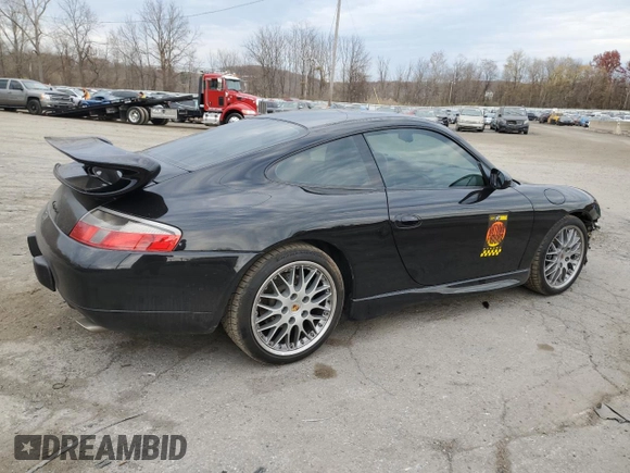 1999 Porsche 911 with VIN WP0AA2990XS626600, listed as a Copart auction lot 79217264 with 82,978 mi miles and Salvage Title. Bid and sale history available at DreamBid. Image 3.