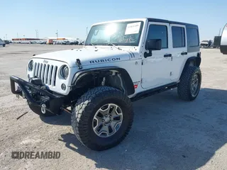 2014 Jeep Wrangler Unlimited Rubicon with VIN 1C4BJWFG1EL167423, listed as a IAAI auction lot 41861109 with 104,669 mi miles. Bid and sale history available at carsss.com. Image 18.