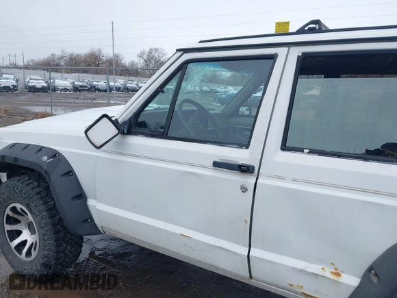 1990 Jeep Cherokee with VIN 1J4FJ78L0LL217723, listed as a IAAI auction lot 41788403 with 147,557 mi miles and . Bid and sale history available at DreamBid. Image 15.