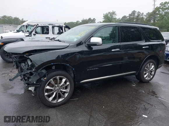 2023 Dodge Durango Citadel with VIN 1C4RDJEG1PC582304, listed as a IAAI auction lot 42528327 with 9,896 mi miles and . Bid and sale history available at DreamBid. Image 19.