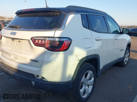 2019 Jeep Compass Latitude with VIN 3C4NJDBB4KT714079, listed as a IAAI auction lot 41317866 with 76,601 mi miles and . Bid and sale history available at DreamBid. Image 6.