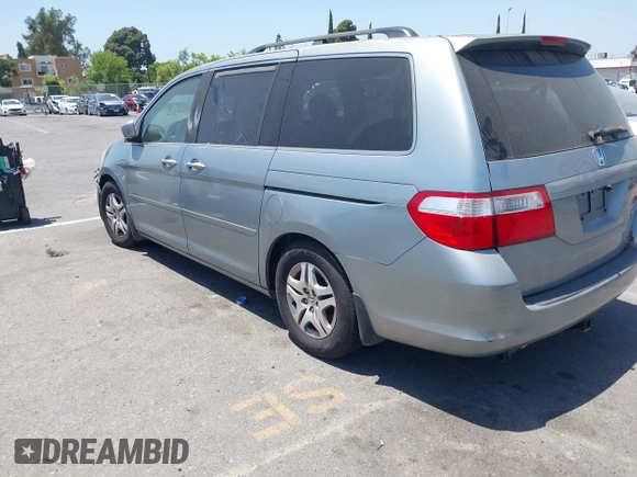 2005 Honda Odyssey EX with VIN 5FNRL38415B086709, listed as a IAAI auction lot 42308829 with 187,351 mi miles and . Bid and sale history available at DreamBid. Image 3.